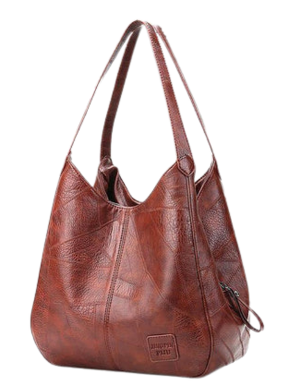 Kelly™ – Tyylikäs vintage laukku